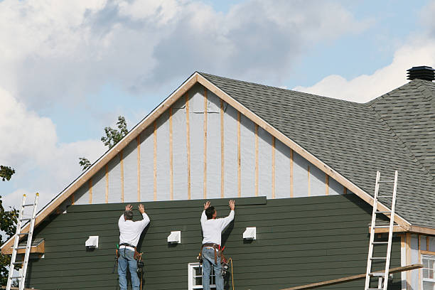 Professional Siding Replacement technician working in Moores Hill, IN